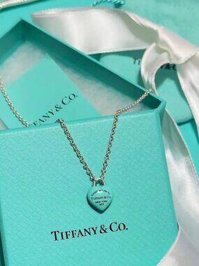 Tiffany & Co. Return to Tiffany Mini Heart Lock Pendant Necklace in Silver with